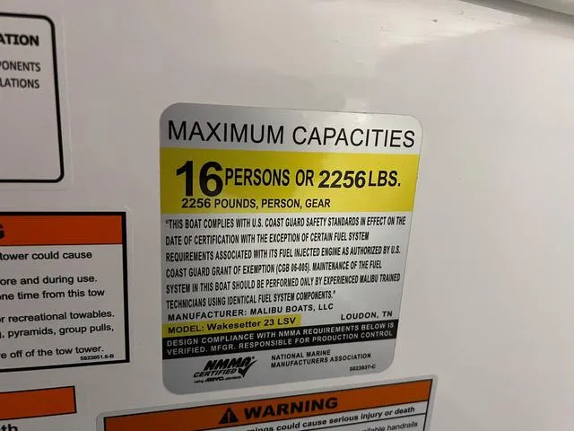 Slide: The Image of 2024 Malibu 23 LSV capacity label: 16 persons or 2256 lbs maximum load. - 41