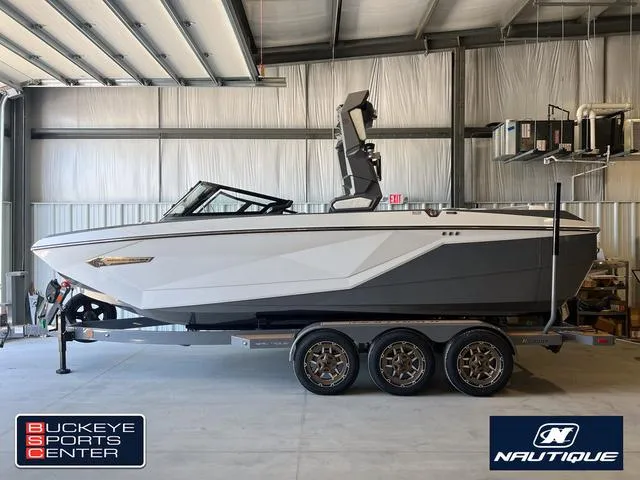 Slide: The Image of 2024 Nautique Super Air Nautique G23 boat on trailer at Buckeye Sports Center. - 2