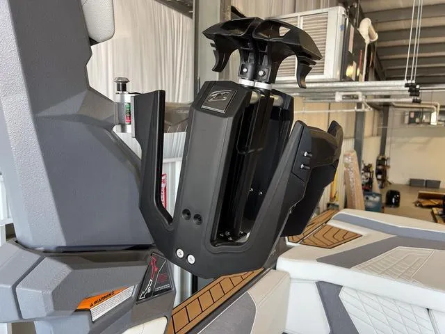 Slide: The Image of 2024 Nautique Super Air Nautique G23 wakeboard tower in a showroom. - 38