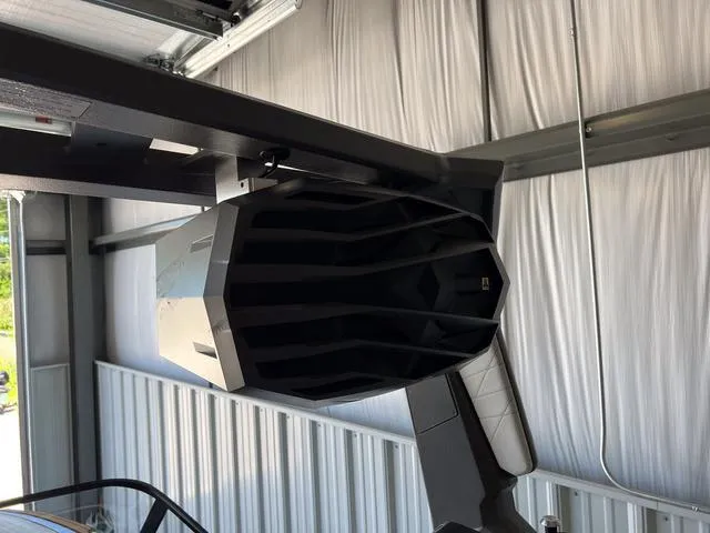 Slide: The Image of 2024 Nautique Super Air Nautique G23 boat speaker system in a garage. - 40