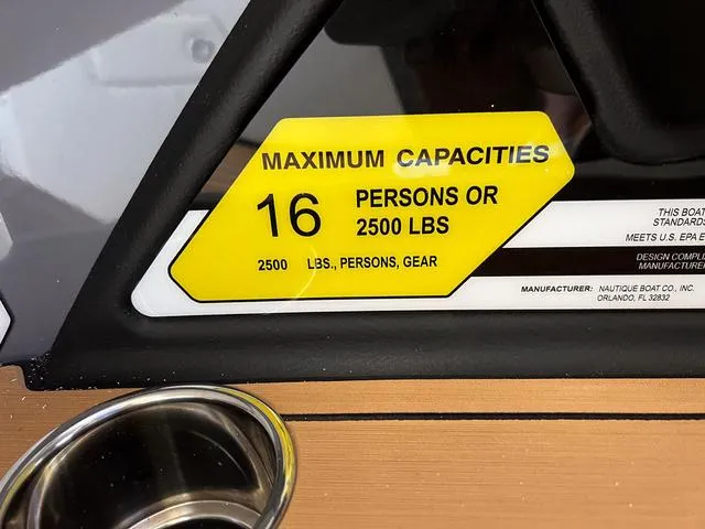 Slide: The Image of 2024 Nautique Super Air Nautique G23 maximum capacity label, 16 persons or 2500 lbs. - 47