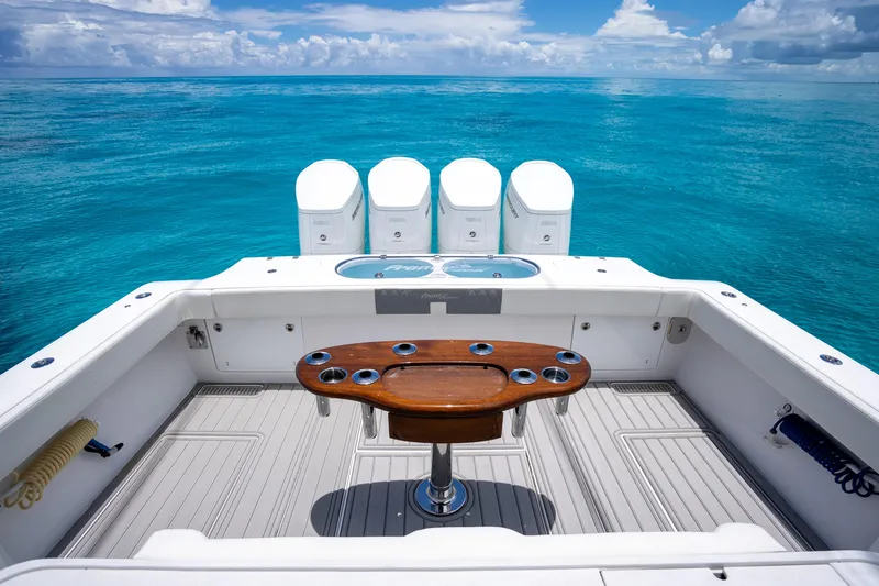 Slide: The Image of 2023 Front Runner 47 Center Console boat on clear blue ocean. - 11