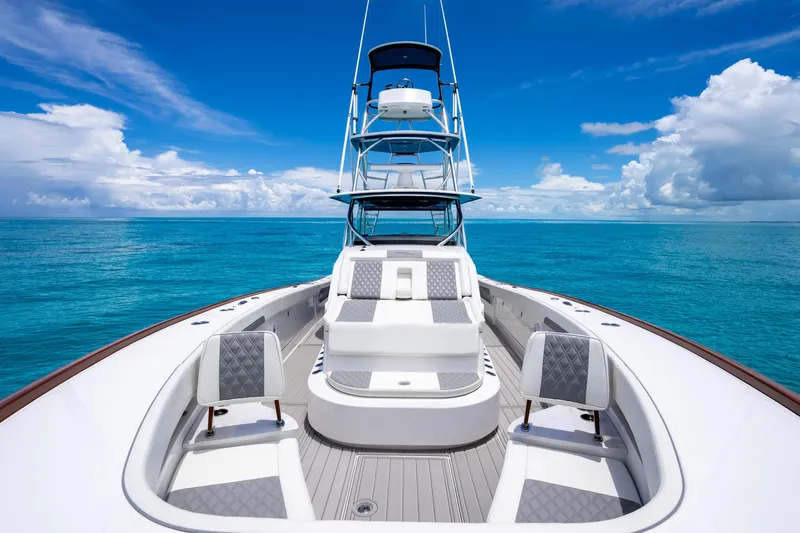 Slide: The Image of 2023 Front Runner 47 Center Console boat on clear blue ocean. - 16