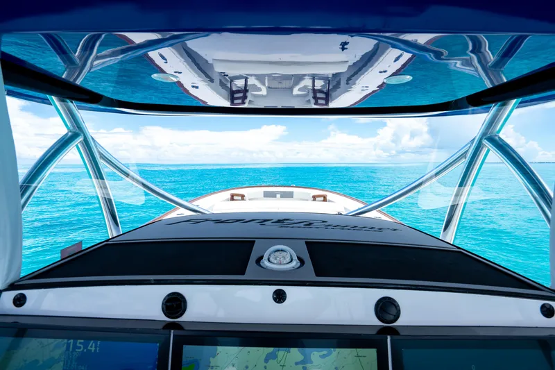 Slide: The Image of 2023 Front Runner 47 Center Console boat dashboard with ocean view. - 25