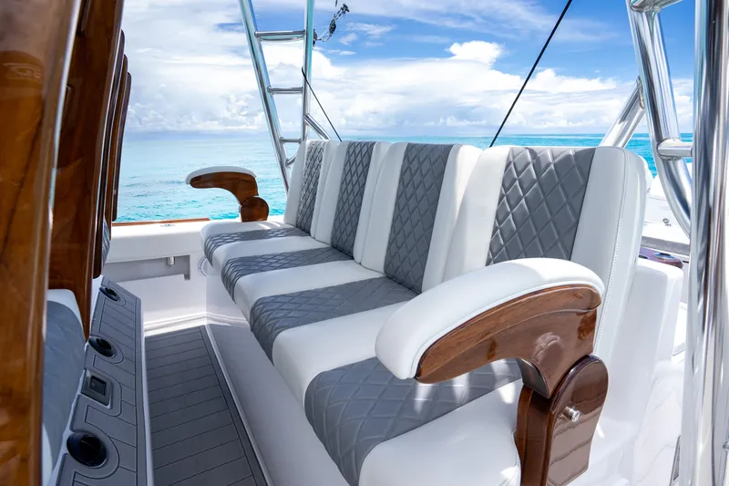 Slide: The Image of 2023 Front Runner 47 Center Console boat with luxurious seating and ocean view. - 3