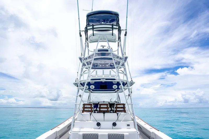 Slide: The Image of 2023 Front Runner 47 Center Console boat on open water under a cloudy sky. - 32