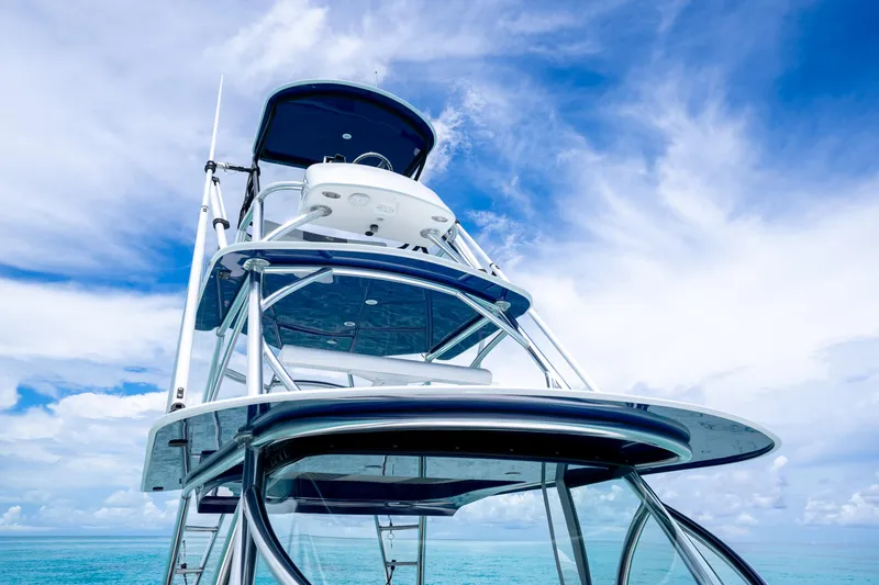 Slide: The Image of 2023 Front Runner 47 Center Console boat against a clear blue sky. - 34