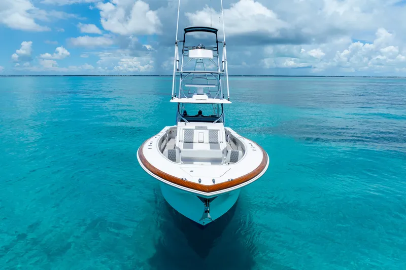 Slide: The Image of 2023 Front Runner 47 Center Console boat on clear blue water. - 44