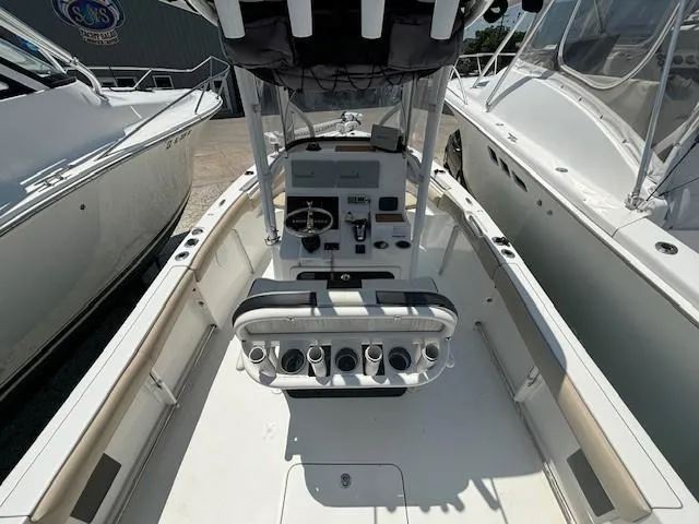 Slide: The Image of 2017 Sea Pro 219 Center Console boat interior with helm and seating. - 6