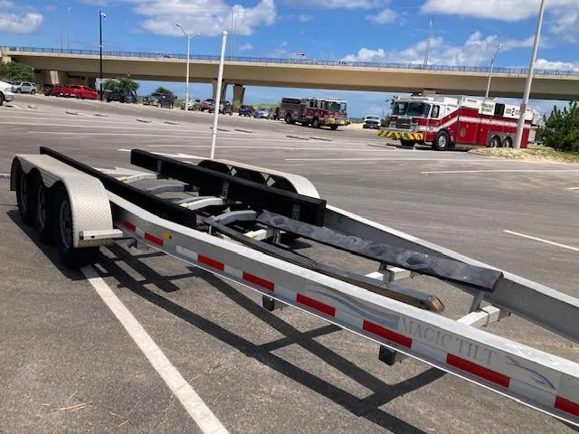 Slide: The Image of Empty boat trailer in parking lot, suitable for 2006 Chaparral 276 SSi. - 10