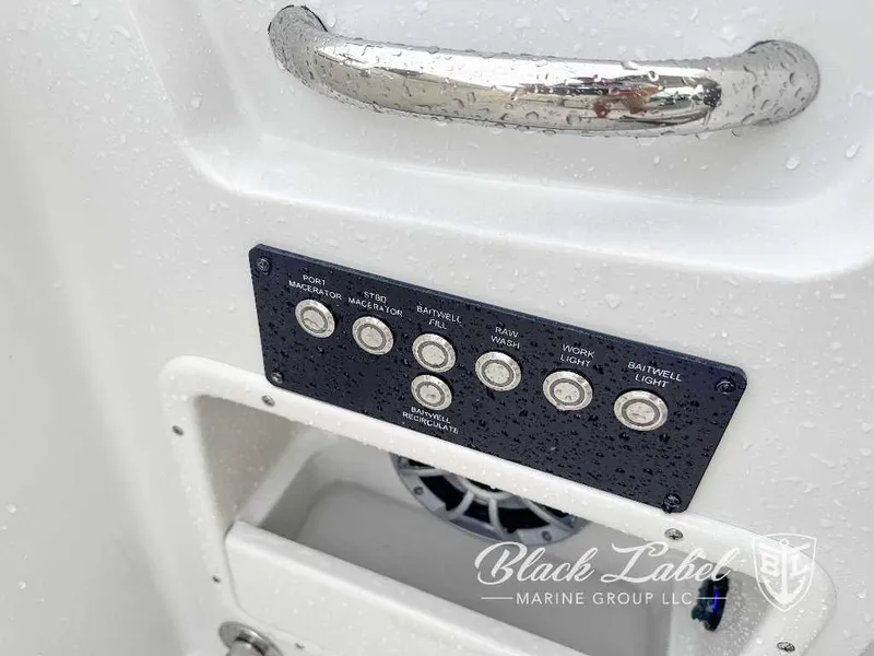 Slide: The Image of Control panel of the 2024 Finseeker 240 DC boat by Black Label Marine Group. - 13