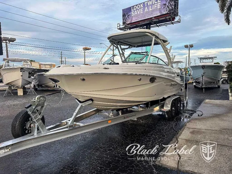Slide: The Image of 2024 Finseeker 240 DC boat on trailer at Black Label Marine Group dealership. - 18