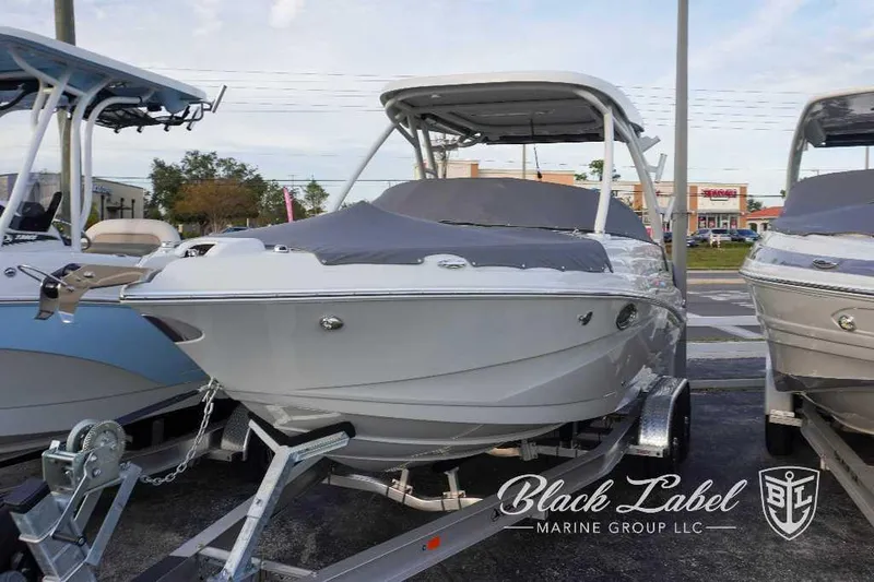 Slide: The Image of 2024 Finseeker 240 DC boat on trailer at Black Label Marine Group dealership. - 24