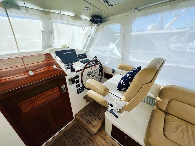 Slide: The Image of Interior of 2013 MJM 40z Downeast boat with helm and seating area. - 25