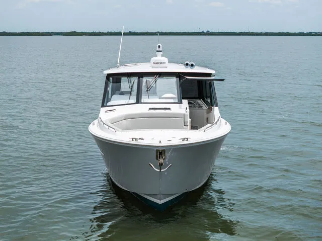 Slide: The Image of New WALKERBAY 325 DLX inflatable dinghy with 2022 Honda 20 hp outboard engine in storage. - 45