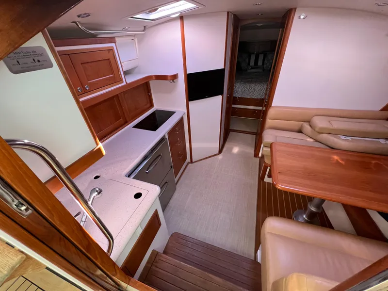 Slide: The Image of Interior of 2013 MJM 40z Downeast yacht with modern kitchen and seating area. - 27