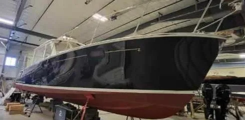 Slide: The Image of 2013 MJM 40z Downeast boat in a storage facility. - 8