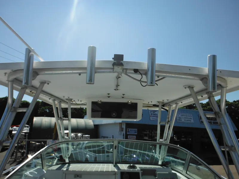 Slide: The Image of 2000 Seaswirl 2300 Walk Around boat with hardtop and rod holders. - 18