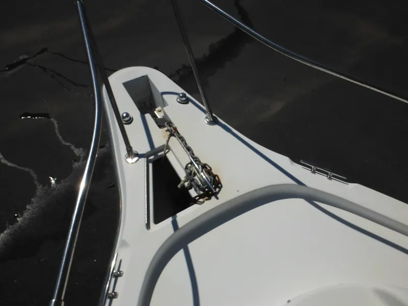 Slide: The Image of Bow of 2000 Seaswirl 2300 Walk Around boat with anchor chain. - 29