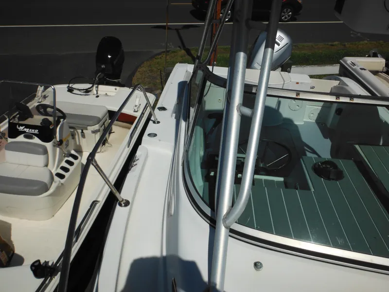 Slide: The Image of 2000 Seaswirl 2300 Walk Around boat deck and cockpit view. - 31