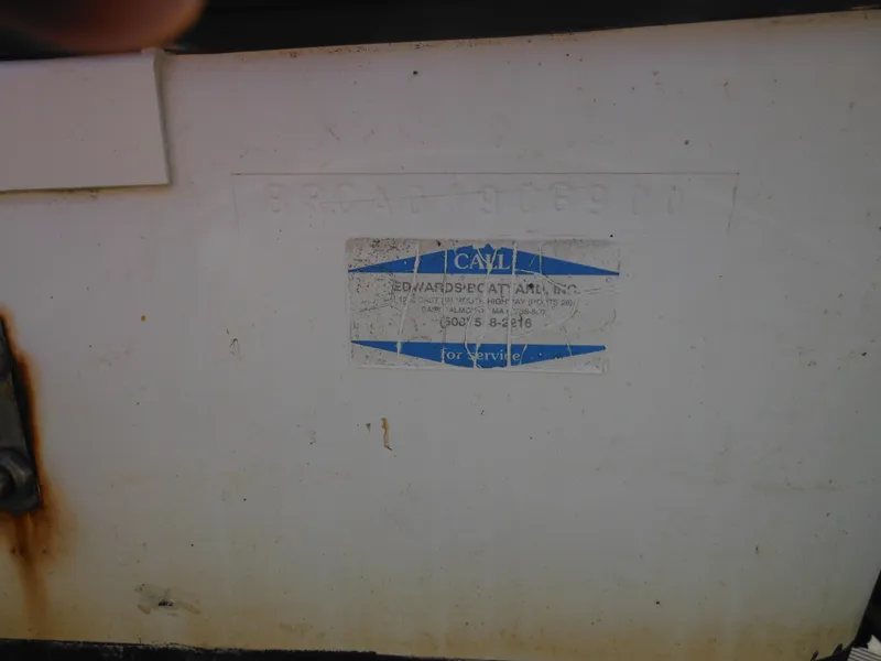 Slide: The Image of 2000 Seaswirl 2300 Walk Around boat hull identification number and manufacturer label. - 5