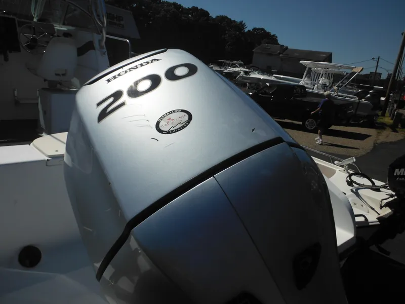 Slide: The Image of Honda 200 outboard motor on a 2000 Seaswirl 2300 Walk Around boat. - 7