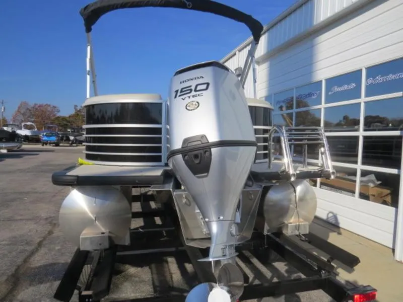 Slide: The Image of 2023 Coach Pontoons 243 RFC with Honda 150 VTEC outboard motor. - 6
