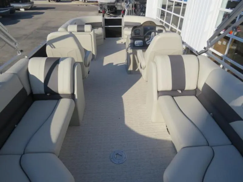 Slide: The Image of 2023 Coach Pontoons 243 RFC interior with spacious seating and modern design. - 7