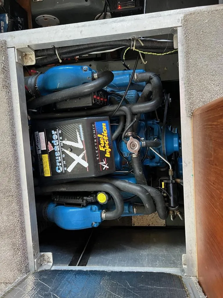 Slide: The Image of 1994 Carver 355 Aft Cabin engine compartment with Crusader XL engine. - 27