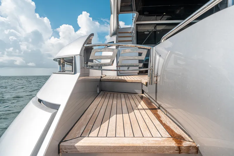Slide: The Image of 2012 Pershing 92 yacht with wooden deck and ocean view. - 18