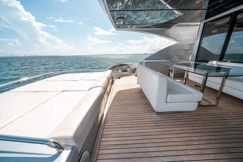 Slide: The Image of Luxurious deck of 2012 Pershing 92 yacht with ocean view and modern seating. - 21