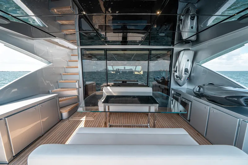 Slide: The Image of Luxurious interior of 2012 Pershing 92 yacht with modern furnishings and ocean view. - 24