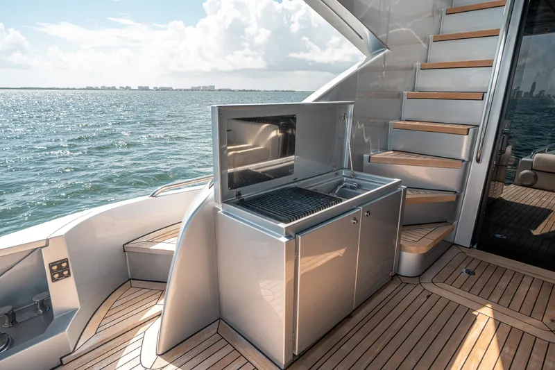 Slide: The Image of Outdoor kitchen on the deck of a 2012 Pershing 92 yacht. - 27