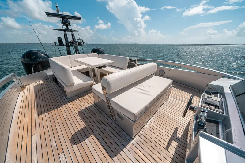 Slide: The Image of Luxurious deck of 2012 Pershing 92 yacht with seating and ocean view. - 29