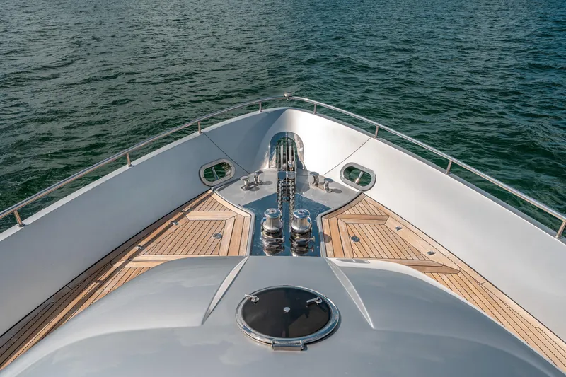 Slide: The Image of Bow of 2012 Pershing 92 yacht on calm water. - 38