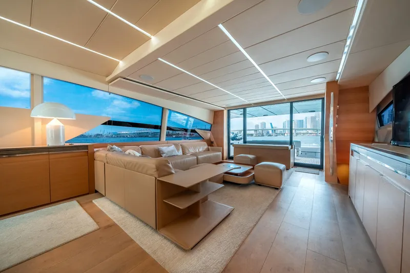 Slide: The Image of Luxurious interior of a 2012 Pershing 92 yacht with modern furnishings and panoramic windows. - 42