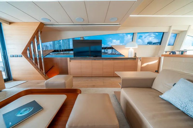 Slide: The Image of Luxurious interior of 2012 Pershing 92 yacht with modern furnishings and panoramic windows. - 43