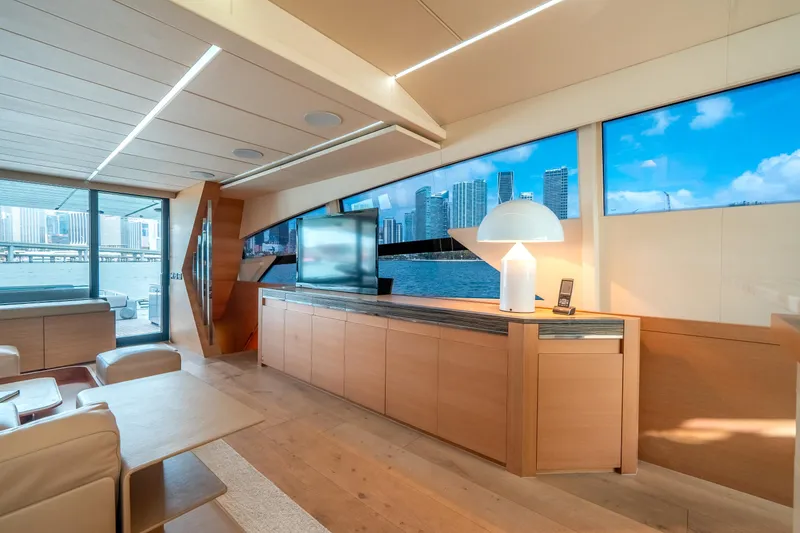 Slide: The Image of Luxurious interior of 2012 Pershing 92 yacht with city skyline views. - 44
