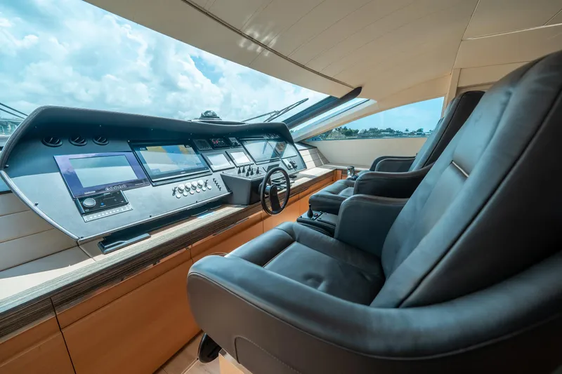 Slide: The Image of Helm station of 2012 Pershing 92 yacht with modern navigation equipment. - 47