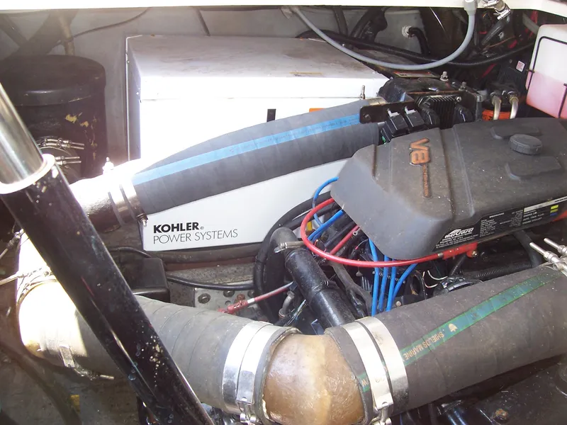 Slide: The Image of Engine compartment of a 1999 Shamrock 290 Walkaround with Kohler Power Systems. - 5