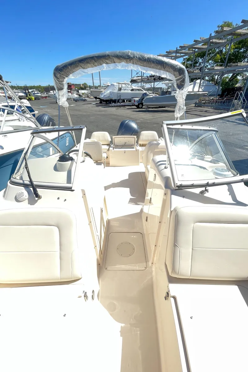 Slide: The Image of 2025 Grady-White Freedom 215 boat interior with dual consoles and open deck. - 8