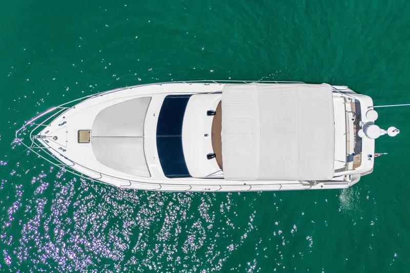 Slide: The Image of Azimut 43 Fly 1998 yacht, aerial view, cruising on turquoise water. - 32