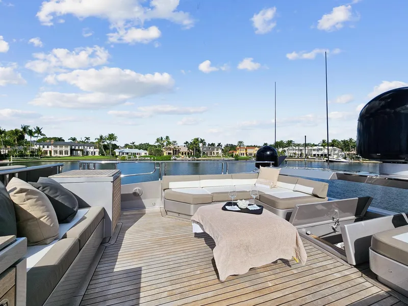 Slide: The Image of Luxurious deck of 2008 Palmer Johnson 120 Sports Cruiser with waterfront view. - 17