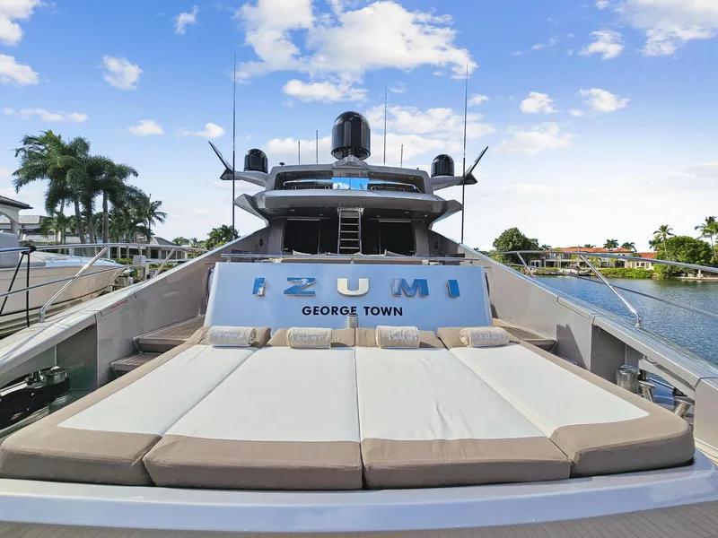 Slide: The Image of 2008 Palmer Johnson 120 Sports Cruiser yacht docked, featuring a sunbathing area. - 20