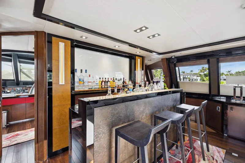 Slide: The Image of Luxurious bar area inside a 2008 Palmer Johnson 120 Sports Cruiser yacht. - 35