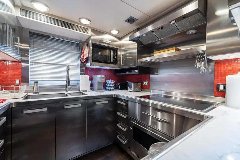 Slide: The Image of Modern kitchen in a 2008 Palmer Johnson 120 Sports Cruiser yacht. - 39