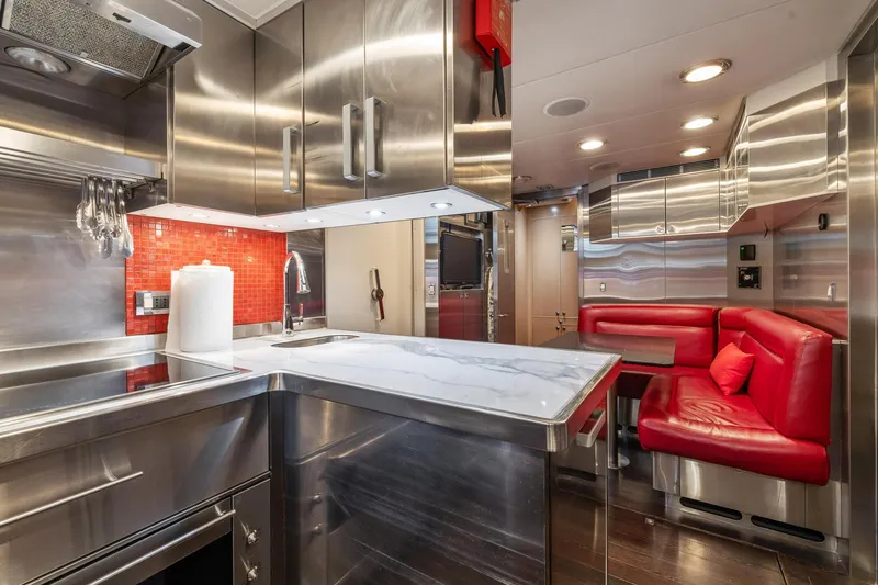 Slide: The Image of Modern kitchen and dining area in 2008 Palmer Johnson 120 Sports Cruiser yacht. - 40
