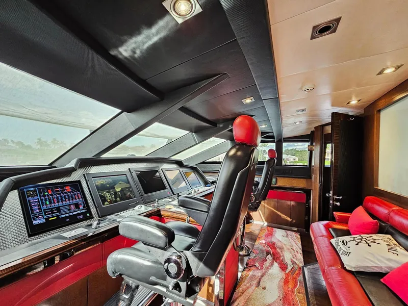 Slide: The Image of Luxurious helm of a 2008 Palmer Johnson 120 Sports Cruiser with advanced navigation systems. - 41