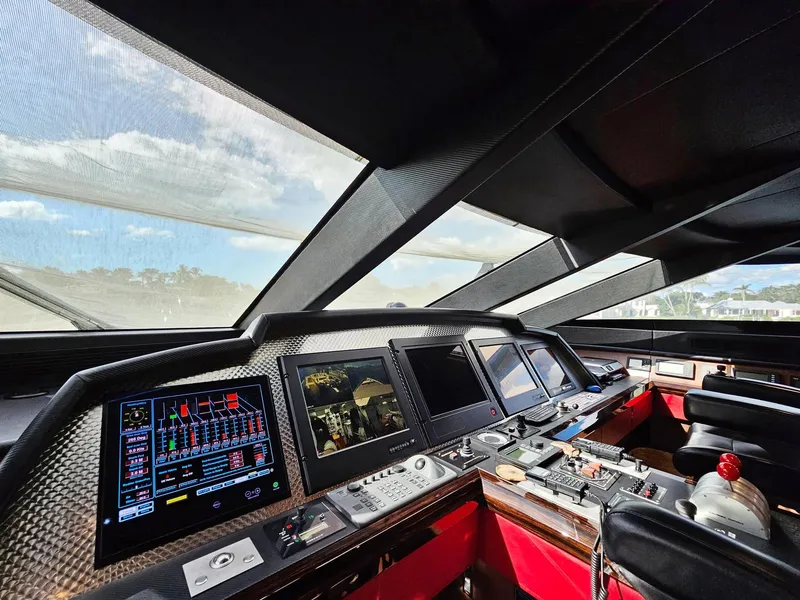 Slide: The Image of 2008 Palmer Johnson 120 Sports Cruiser cockpit with advanced navigation systems. - 42