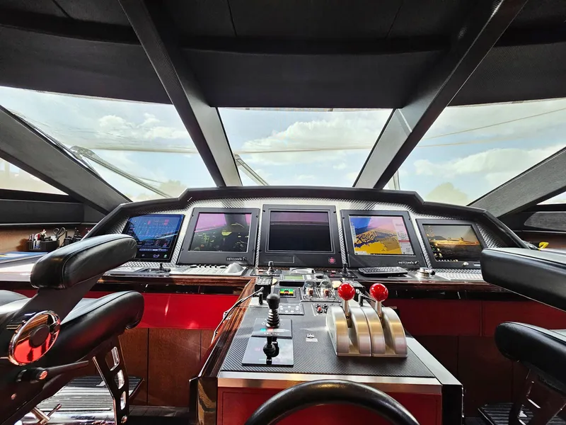 Slide: The Image of Cockpit of 2008 Palmer Johnson 120 Sports Cruiser with advanced navigation systems. - 43
